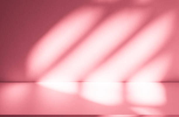 istock Wall interior background, studio, and backdrops show products. with shadow from window color white and pink light. background for text insertion and presentation of product 2189125478
