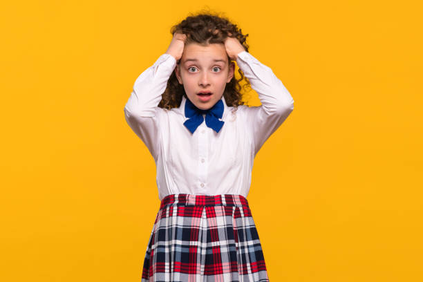 istock Girl holding her head with both hands 2189127717