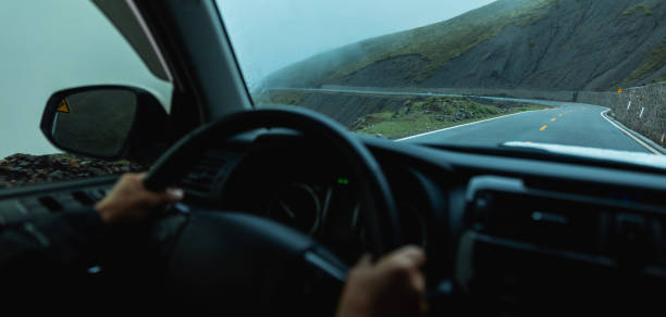 istock Driving offroad car on high elevation mountains 2189129393
