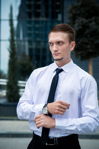 istock Caucasian man manager on city center background. Freelancer 2189129748