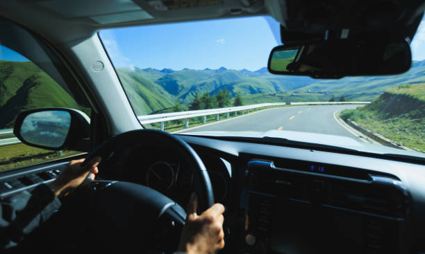 istock Driving offroad car on high elevation mountains 2189129826