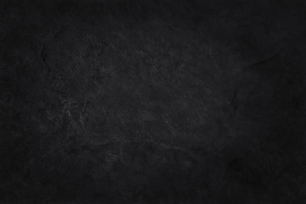 istock Dark grey black slate texture in natural pattern with high resolution for background and design art work. Black stone wall. 2189138438