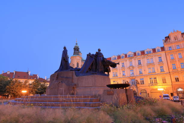Jan Hus monument (Pamatnik Jana Husa) in the historic center with many Gothic buildings in Prague Czech (Praha, Czechia)
