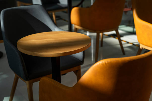 istock cafe chair and table, in sunlight 2189145798