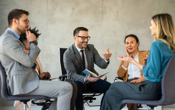 istock Support with group, therapy and mental health with help, people together talking about problem 2189145957