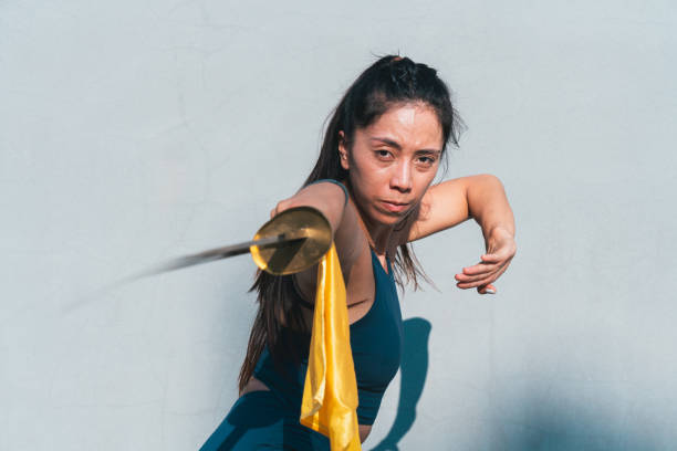 istock Chinese young woman practicing wushu kung fu. 2189148062