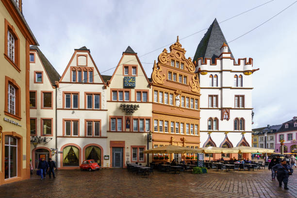 Trier, Germany - October 11, 2024: Street scene, with various buildings, locals and visitors, in Trier, Rhineland-Palatinate, Germany