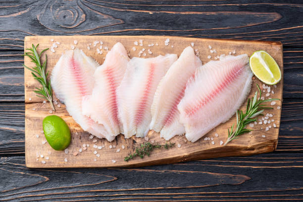 istock Raw tilapia fillet photography . Top view 2189148663