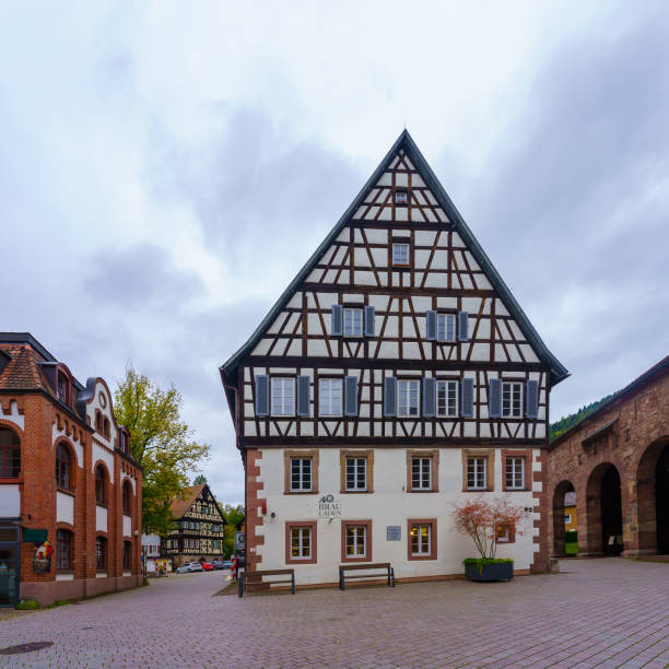 Alpirsbach, Germany - October 15, 2024: Street view with various buildings, in Alpirsbach, the Black Forest, Baden-Wurttemberg, Germany