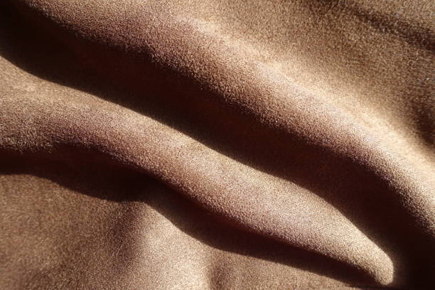 istock Folded chocolate brown faux suede polyester fabric 2189151794