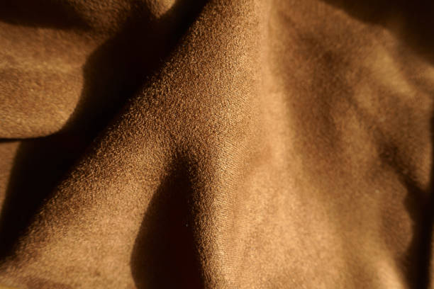 istock Crumpled chocolate brown faux suede polyester fabric 2189151839