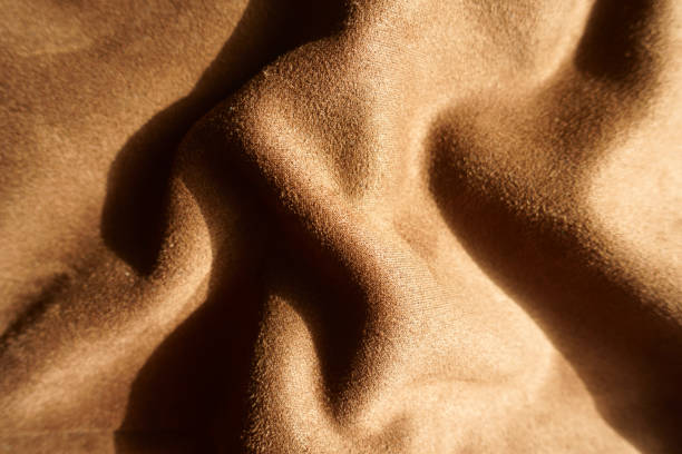 istock Draped chocolate brown faux suede polyester fabric 2189151840