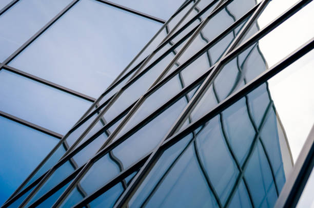 istock reflection with distortion in the window of a modern tall building 2189152671