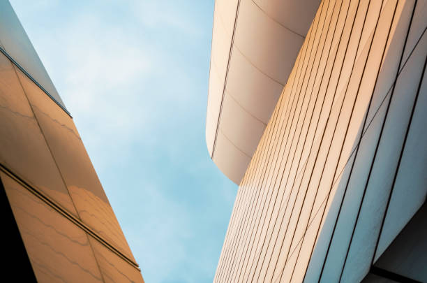 istock walls of a modern building against a blue sky 2189152716