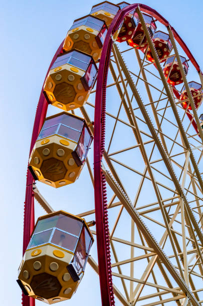 istock ferris wheel in the park against the blue sky 2189152810