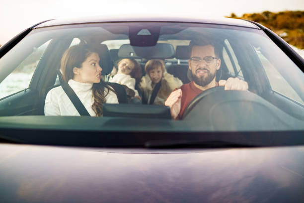 istock Parents argue while traveling by car with children 2189152835