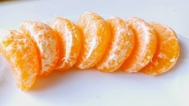 istock peeled tangerine fruit. 2189153914