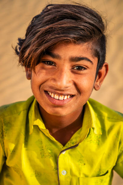 istock Happy Indian boy in desert village, India 2189155664
