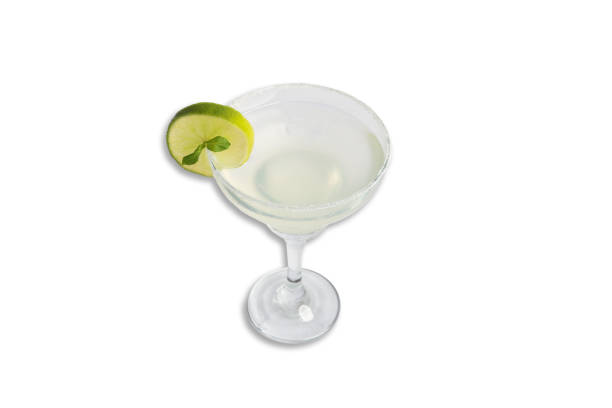 istock Refreshing cocktail garnished with lime on isolated background 2189156318