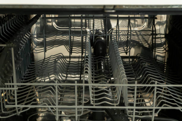 istock Interior view of a modern dishwasher showcasing rack design and layout 2189158126