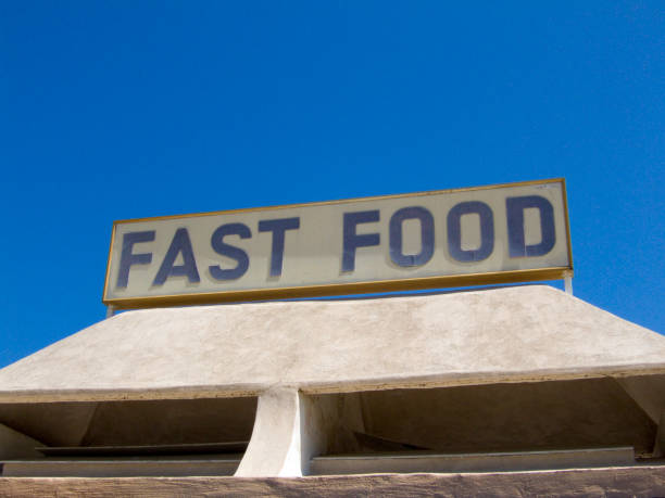 USA, Wyoming West Yellowstone   broken hamburger signage