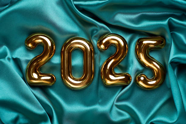 istock Happy New Year 2025 background with 2025 numbers on silk fabric texture 2189160358