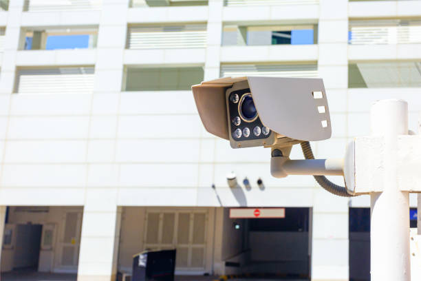 istock Outdoor CCTV security camera on building background with place for text. 2189161769