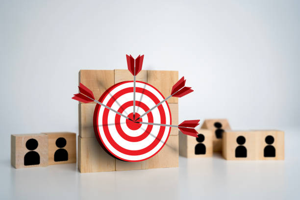 istock Red dartboard and black arrow connection linkage with human icon for customer focus target group 2189164196