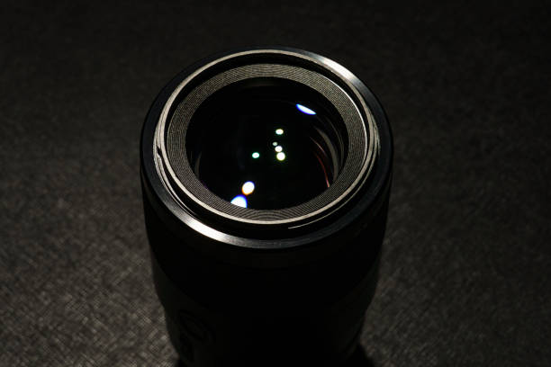 istock Close up of camera lens on dark background 2189165334