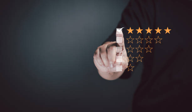 istock Customer satisfaction concept. Customer services best excellent business rating experience. survey opinion review. right mark emoticon on a wooden figurines indicates satisfaction for five star rating. 2189167419