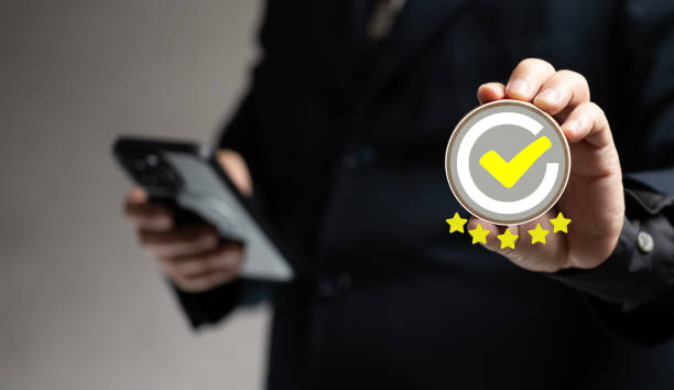 Customer satisfaction concept. Customer services best excellent business rating experience. survey opinion review. right mark emoticon on a wooden figurines indicates satisfaction for five star rating.