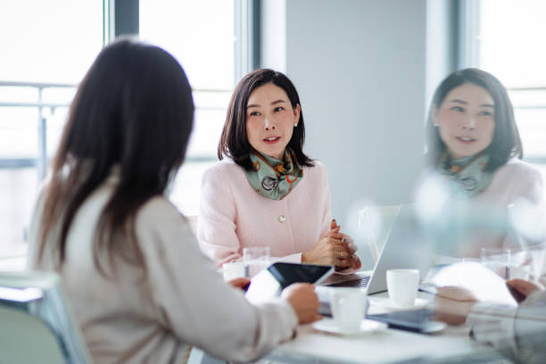 istock Asian Businesswomen Collaborating in Modern Office 2189170752