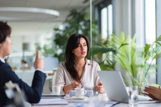 istock Multiracial Team Engaged in Business Discussion in Modern Office 2189170760
