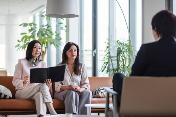 istock Business Meeting with Multiracial Colleagues in Office 2189170862