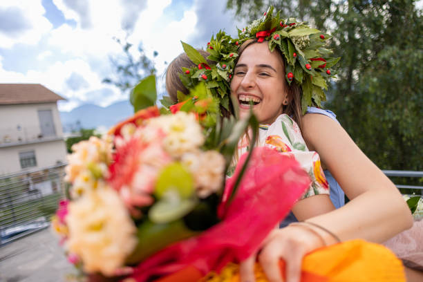 istock Two women sharing hugs and smiles on their graduation day 2189172111