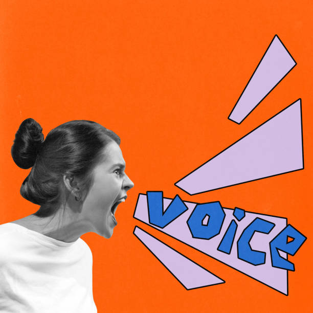 istock Woman shouting with bold typography spelling Voice, symbolizing empowerment, communication, and strong self-expression on orange background. 2189175180