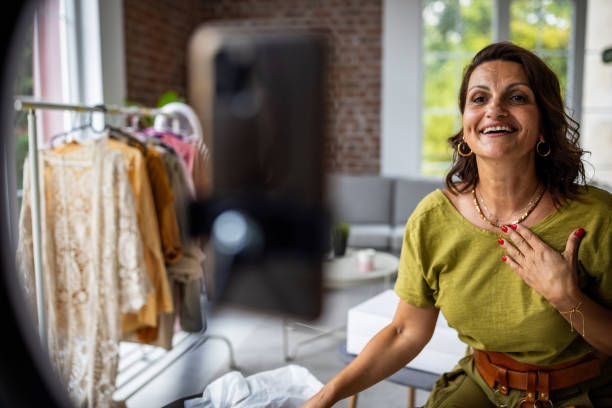 istock Cheerful Woman Engaging in Live Video Session 2189175275