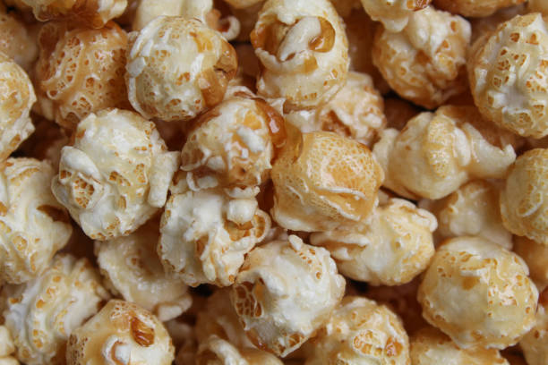 istock Background texture of caramel popcorn. Popcorns coated by melted sugar 2189176958