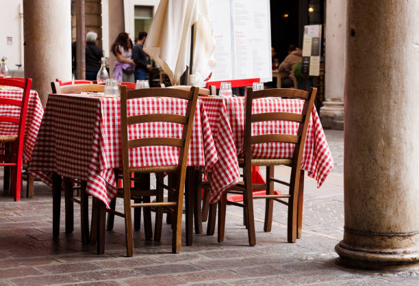 istock Empty Tables and Chairs Outside of Restaurant, Mantua 2189178367