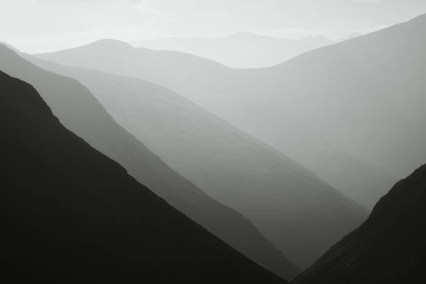 istock High mountains slopes in black and white 2189178726