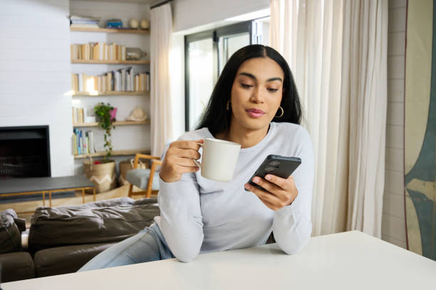 istock Transgender person looking at smart phone 2189187572