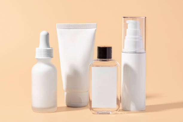 istock A set of various cosmetic containers on a soft beige background. 2189188805