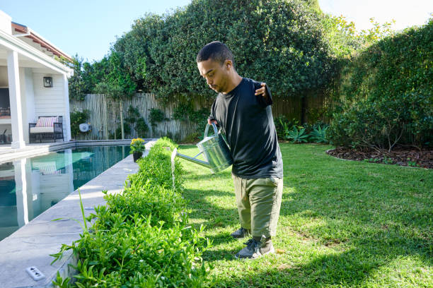 Man with phocomelia gardening