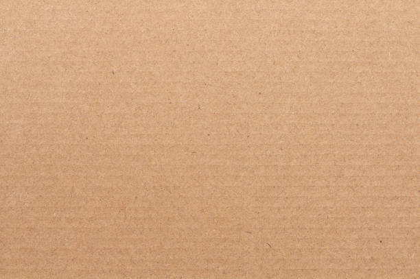 istock Cardboard sheet texture background, detail of recycle brown paper box pattern. 2189189286