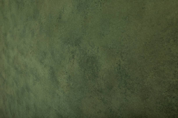 istock Forest green background with  strong light strokes and abstract texture. Empty old wall. 2189189299