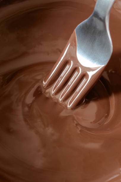 istock Melted hot chocolate with mixing metal fork 2189189313