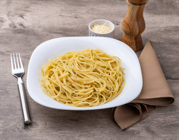 istock Spaghetti pasta in a plate with garlic and olive oil 2189189850