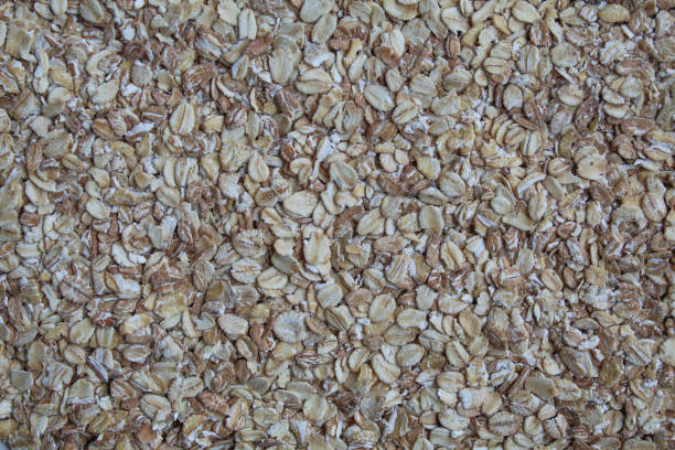 istock Background texture of rolled oats, flat lay or top view 2189191668