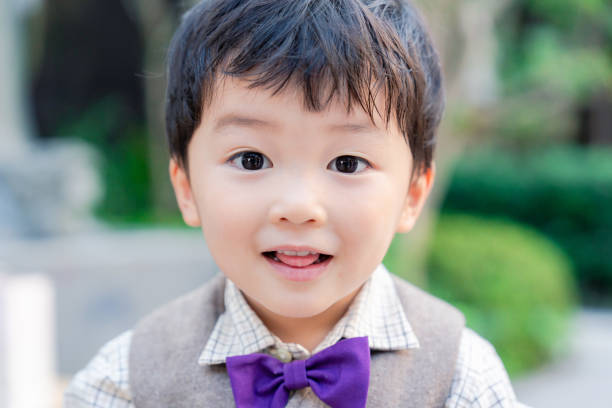 A little boy in fashionable clothes