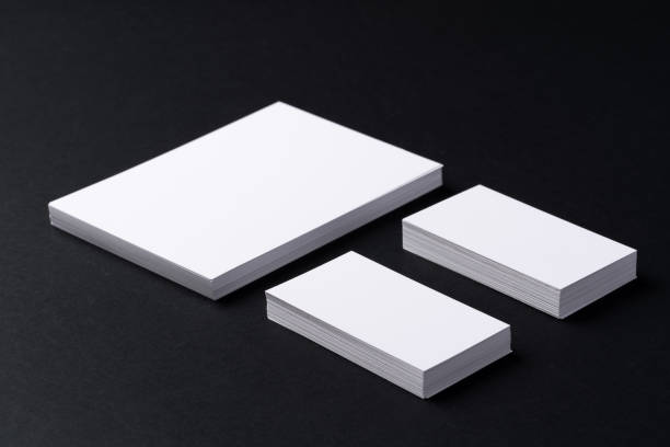 istock White blank business cards on dark black background 2189192890